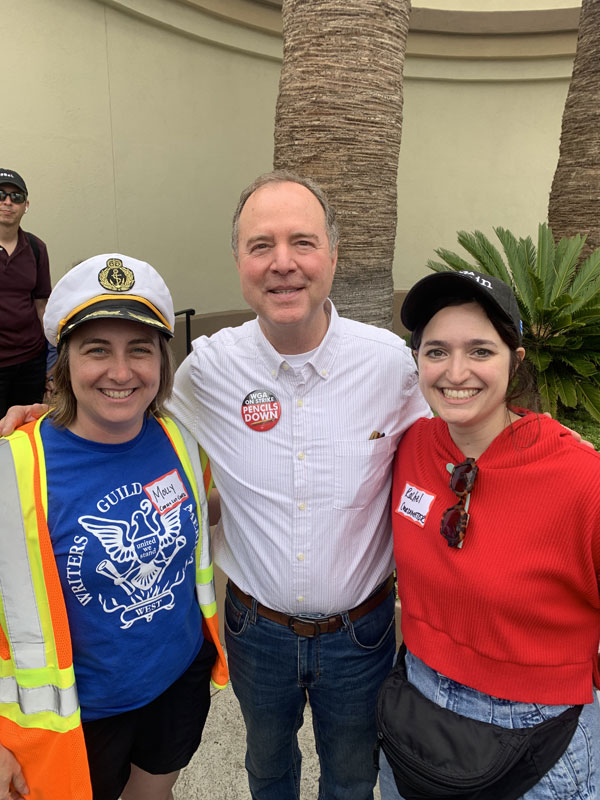 Congressmember Adam Schiff joins WGAW Board member Molly Nussbaum and strike captain Rachel Alter on the picket line at Paramount Studios.